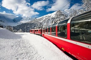 train through snow covered switzerland train