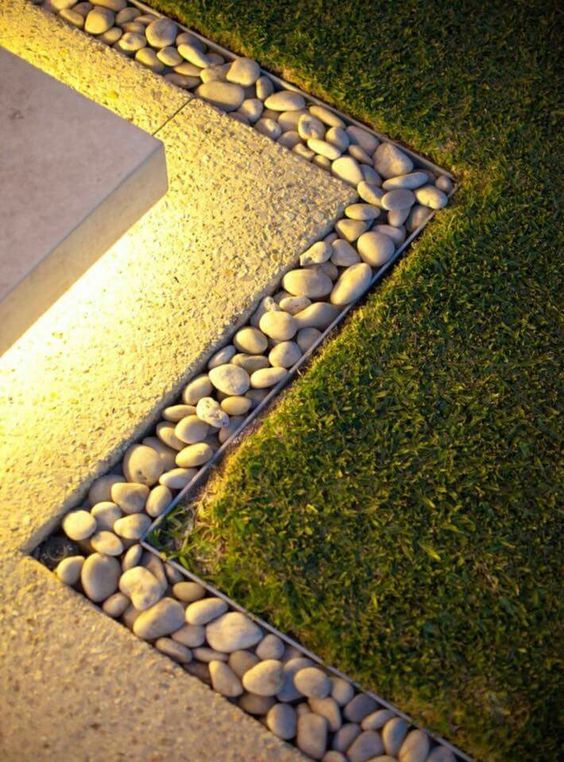 Beautiful Gardening Edging and Lighting Along with River Stones