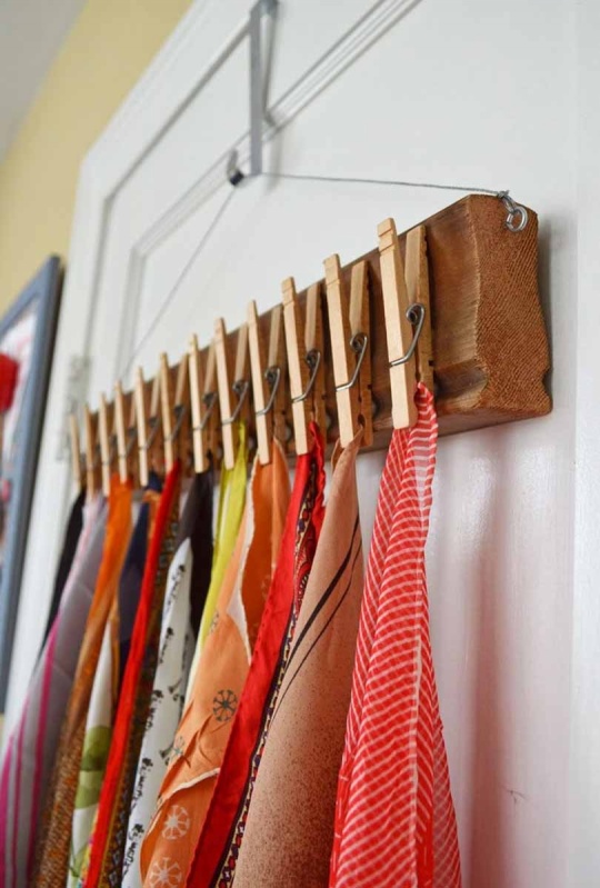 31 Creative DIY Storage Solution with Clothespins over Wooden Board as the Quick Closet Organizer