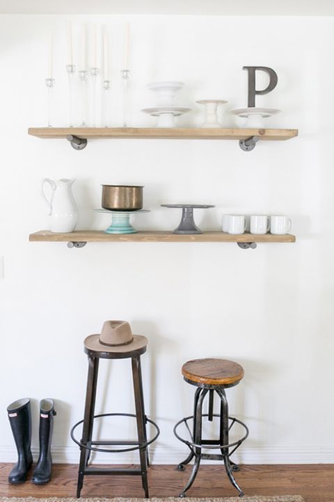 20 DIY Customary Storage Nook with Wooden Shelves Balanced on Iron Rods and having Free Space Un ...