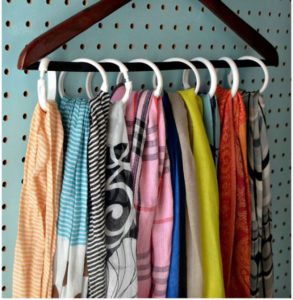 17 Smartly Ordered Clothes by Hanging Them Vertically through Old Curtain Rings inside a Large W ...