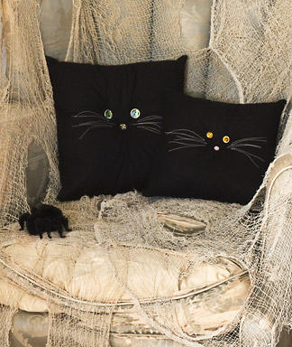 Weird Halloween Cat Pillows with Scary Button Eyes