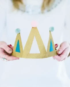 Festive pompom birthday paper crowns