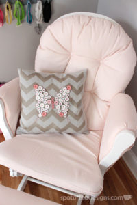 DIY Pillow Decoration with Buttons: Pretty Butterfly over Fabric Surface
