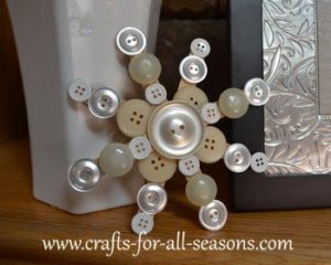 Utterly Simple Button Snowflake over Popsicle Stick Base