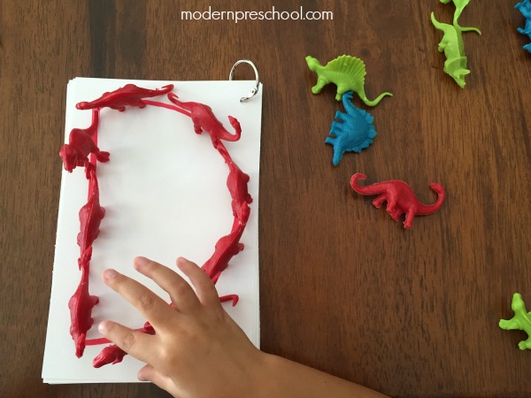 Dinosaur Letter Tracing Activity with Miniature Dinosaurs for Preschoolers