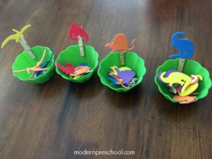 Dinosaur Game Idea with Dino Stickers and Clothespins