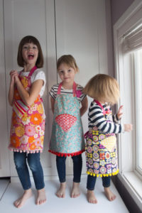 Back-to-School Free Apron Pattern for Growing Girls with Rickrack and Pom-Pom Designs
