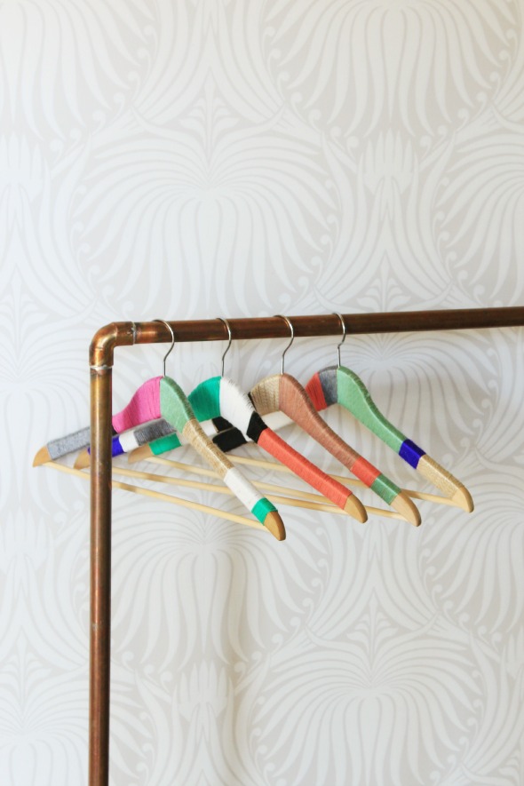 DIY Yarn-Wrapped Clothing Hanger Decor Idea