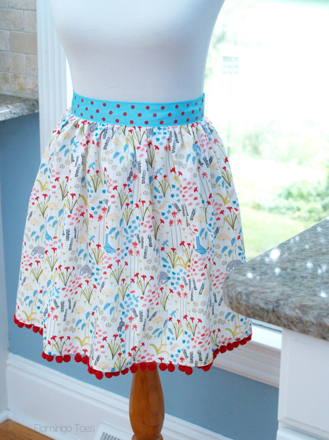 Super Chic DIY Apron with Easy Ribbon Waistband and Pom-Pom Edges
