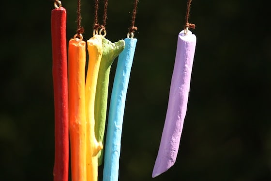 DIY Wind Chime with Rustically Painted Stick in a Rainbow Color Theme