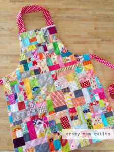 Scrappy Quilted Apron with Colorful Scrap Fabric Pieces and Ribbon Ties