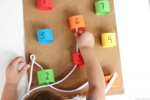 DIY Number Weave Preschool Activity with Colorful Sheets and Shoelace