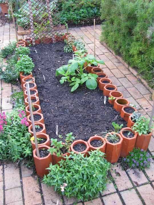 Totally Exclusive DIY Raised Garden Bed Project with Terracotta Pipes