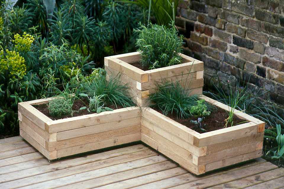 Tutorial of Creating a Wooden Planter with Different Raised Bed Portions with Pressure-Treated T ...