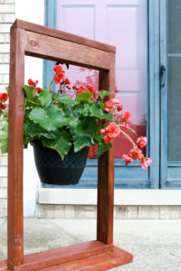 DIY Hanging Planter with Attached Wooden Stand: A Beautiful Craft Idea for Front Porch Area