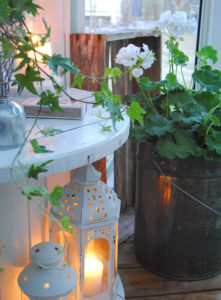Totally Magical Front Porc View Charming Lantern and Metallic Planter with Vintage Touch