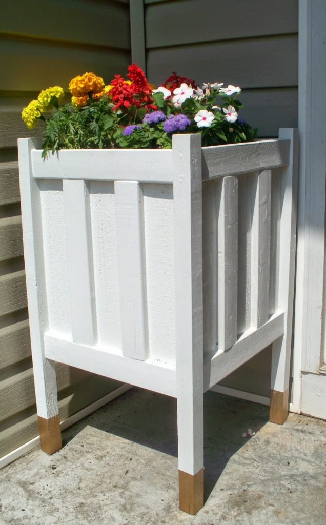 Easy Tutorial of DIY Front Porch Planter With Gold Dipped Legs for A Captivating Porch View