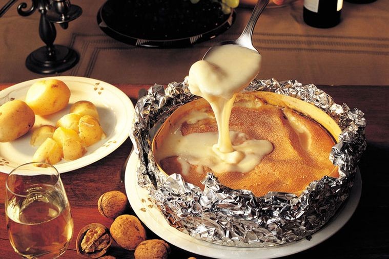 Baked whole Vacherin Mont d’Or with chat potatoes and cornichons – soul-filling culinary
