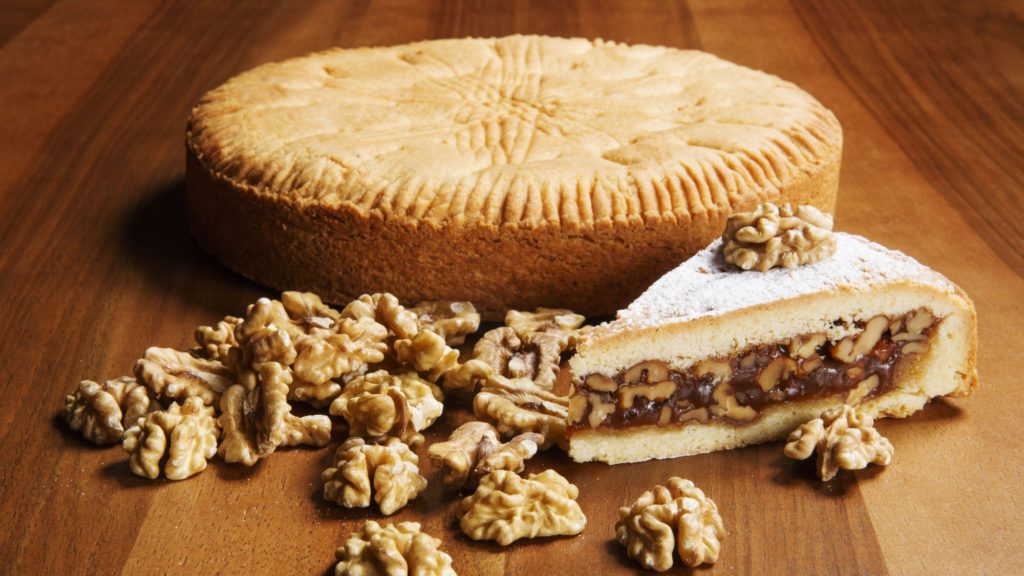 Drool-worthy Swiss FoodGraubünden Nut Pie | Fusion of cream and nuts