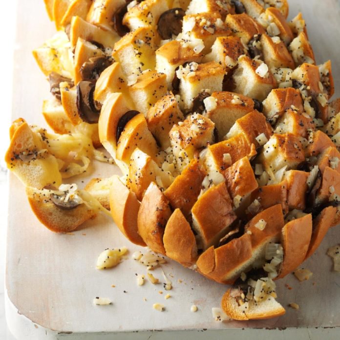 Swiss Mushroom Loaf Appetizer: Loaf stuffed with Swiss cheese and mushrooms
