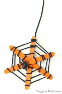 Cute Popsicle Stick Yarn Halloween Spider Web Craft for Toddlers fine Motor Skills