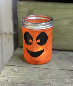 Make spooky Halloween lanterns with Mod Podge Tissue Paper Mason Jar and tealight candles