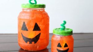 Make Create Halloween Pumpkin Luminaries Craft with Recycled Glass Jars, Mod Podge, Makers, and  ...
