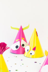 Craft Bright and Colorful Monster Party Hats for this Halloween with Duct tape and Party Hats